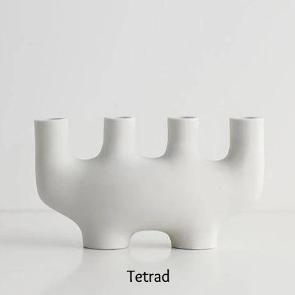 Suporturi pentru lumânări subțiri cu forme curbe scandinave